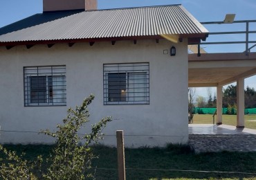 CASA TRES DORMITORIOS, CON AMPLIO TERRENO, PILETA, CUARTO DE GUARDADO, TRES BAÑOS-POTRERO DE GARAY-CORDOBA-ESCRITURA